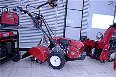 Rear-tine tiller in the showroom