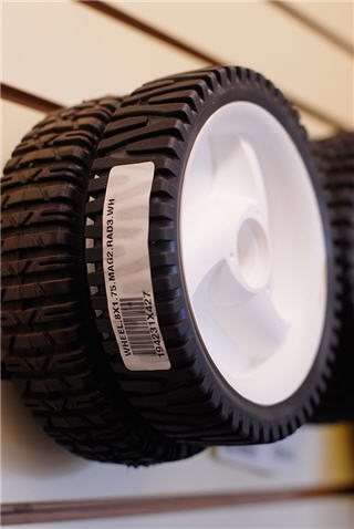 Special-order mower wheels at the parts counter